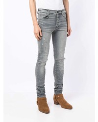 hellblaue enge Jeans mit Destroyed-Effekten von Amiri