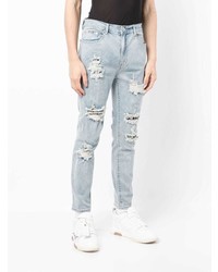 hellblaue enge Jeans mit Destroyed-Effekten von Musium Div.