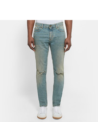 hellblaue enge Jeans mit Destroyed-Effekten von Saint Laurent