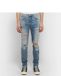 hellblaue enge Jeans mit Destroyed-Effekten von Amiri