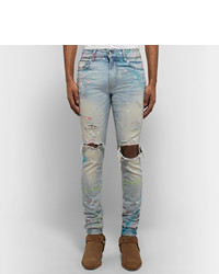 hellblaue enge Jeans mit Destroyed-Effekten von Amiri