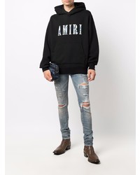 hellblaue enge Jeans mit Destroyed-Effekten von Amiri