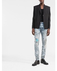 hellblaue enge Jeans mit Destroyed-Effekten von Amiri