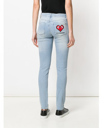 hellblaue enge Jeans mit Destroyed-Effekten von Love Moschino
