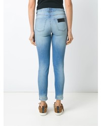 hellblaue enge Jeans mit Destroyed-Effekten von Amapô