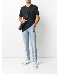 hellblaue enge Jeans mit Destroyed-Effekten von Dolce & Gabbana