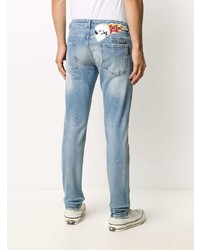 hellblaue enge Jeans mit Destroyed-Effekten von Philipp Plein