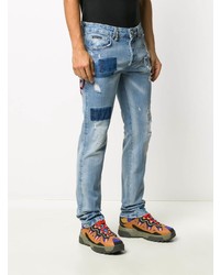 hellblaue enge Jeans mit Destroyed-Effekten von Philipp Plein