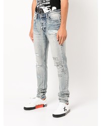 hellblaue enge Jeans mit Destroyed-Effekten von Ksubi