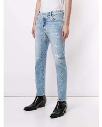 hellblaue enge Jeans mit Destroyed-Effekten von DSQUARED2