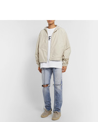 hellblaue enge Jeans mit Destroyed-Effekten von Fear Of God