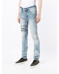 hellblaue enge Jeans mit Destroyed-Effekten von Ksubi