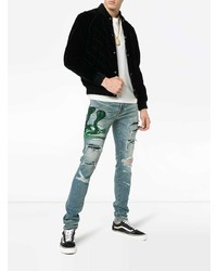 hellblaue enge Jeans mit Destroyed-Effekten von Amiri