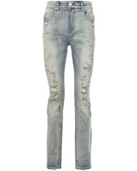 hellblaue enge Jeans mit Destroyed-Effekten von Stampd