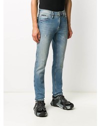 hellblaue enge Jeans mit Destroyed-Effekten von Philipp Plein