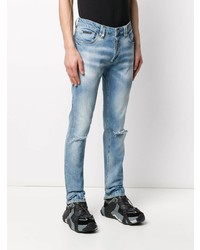 hellblaue enge Jeans mit Destroyed-Effekten von Philipp Plein