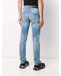 hellblaue enge Jeans mit Destroyed-Effekten von Philipp Plein