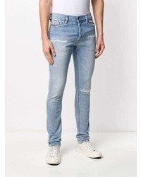 hellblaue enge Jeans mit Destroyed-Effekten von Diesel