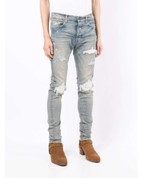 hellblaue enge Jeans mit Destroyed-Effekten von Amiri