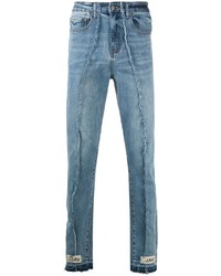 hellblaue enge Jeans mit Destroyed-Effekten von VAL KRISTOPHE