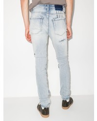 hellblaue enge Jeans mit Destroyed-Effekten von Ksubi