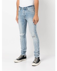 hellblaue enge Jeans mit Destroyed-Effekten von Ksubi