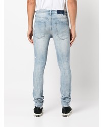 hellblaue enge Jeans mit Destroyed-Effekten von Ksubi