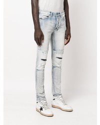 hellblaue enge Jeans mit Destroyed-Effekten von Ksubi