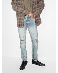 hellblaue enge Jeans mit Destroyed-Effekten von Ksubi