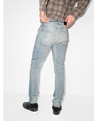 hellblaue enge Jeans mit Destroyed-Effekten von Ksubi