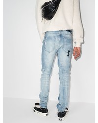 hellblaue enge Jeans mit Destroyed-Effekten von Ksubi