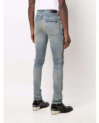 hellblaue enge Jeans mit Destroyed-Effekten von Amiri