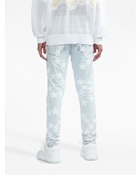 hellblaue enge Jeans mit Destroyed-Effekten von Amiri