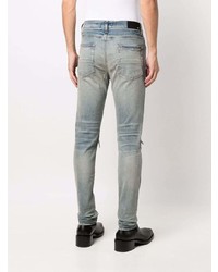 hellblaue enge Jeans mit Destroyed-Effekten von Amiri