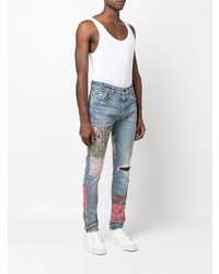 hellblaue enge Jeans mit Flicken von Amiri