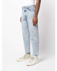 hellblaue Jeans mit Acid-Waschung von Ksubi