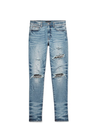 hellblaue Jeans mit Destroyed-Effekten von Amiri