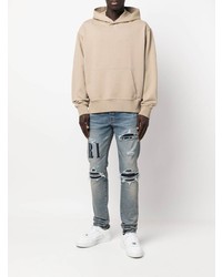 hellblaue Jeans mit Destroyed-Effekten von Amiri