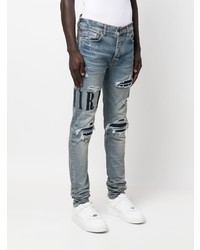 hellblaue Jeans mit Destroyed-Effekten von Amiri