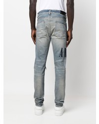 hellblaue Jeans mit Destroyed-Effekten von Amiri