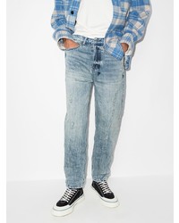 hellblaue Jeans mit Destroyed-Effekten von Ksubi