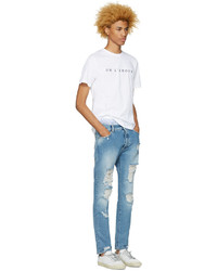 hellblaue Jeans mit Destroyed-Effekten von Palm Angels