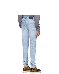 hellblaue Jeans mit Destroyed-Effekten von Ksubi