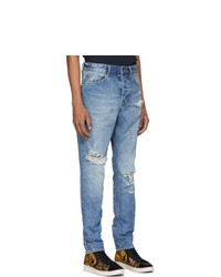 hellblaue Jeans mit Destroyed-Effekten von Ksubi