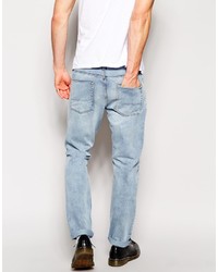 hellblaue Jeans mit Destroyed-Effekten von Asos