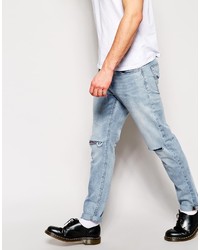 hellblaue Jeans mit Destroyed-Effekten von Asos