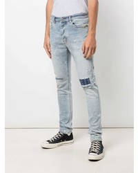 hellblaue Jeans mit Destroyed-Effekten von Ksubi