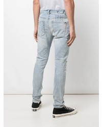 hellblaue Jeans mit Destroyed-Effekten von Ksubi