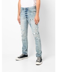 hellblaue Jeans mit Destroyed-Effekten von Ksubi