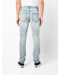 hellblaue Jeans mit Destroyed-Effekten von Ksubi